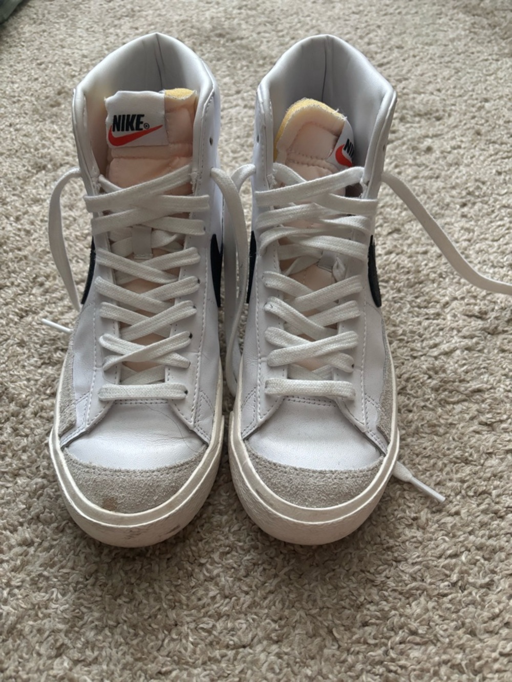 Nike Blazers White High-Top Sneakers with Black Swoosh and Cream Tongue Detail